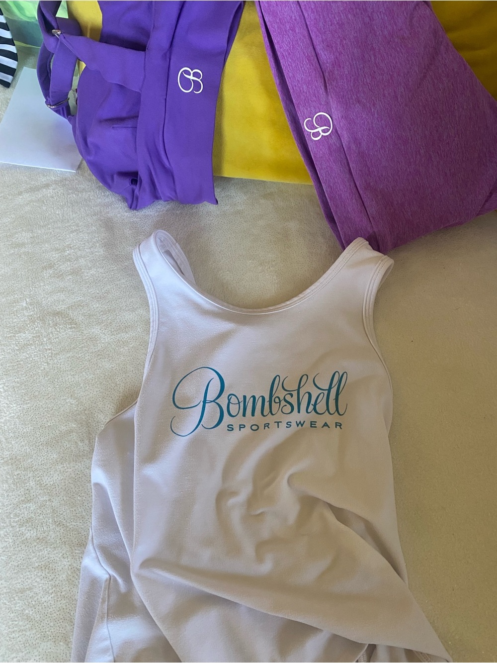 Bombshell Sportswear White Tank with Teal Logo